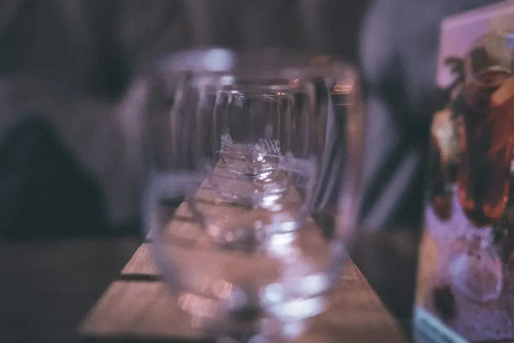 Close-up of wineglasses on table